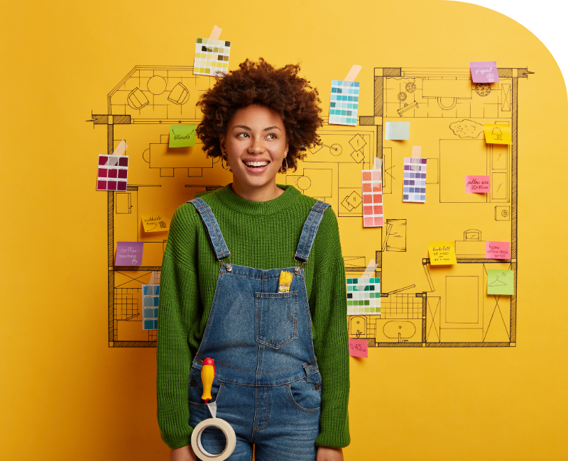 Portrait of a young woman against a floor plan